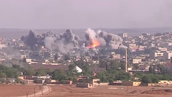U.S.-led coalition airstrike on ISIL positions in Kobane, a town in Rojava, Syria.