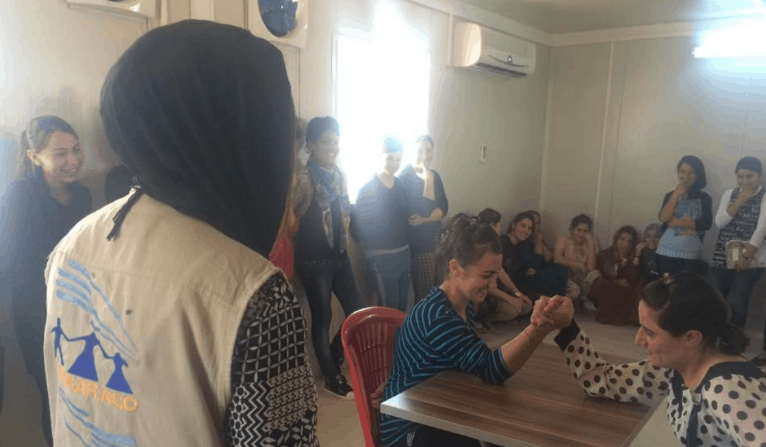 Harikar NGO holds a friendly women's arm wrestling competition at a IDP camp.