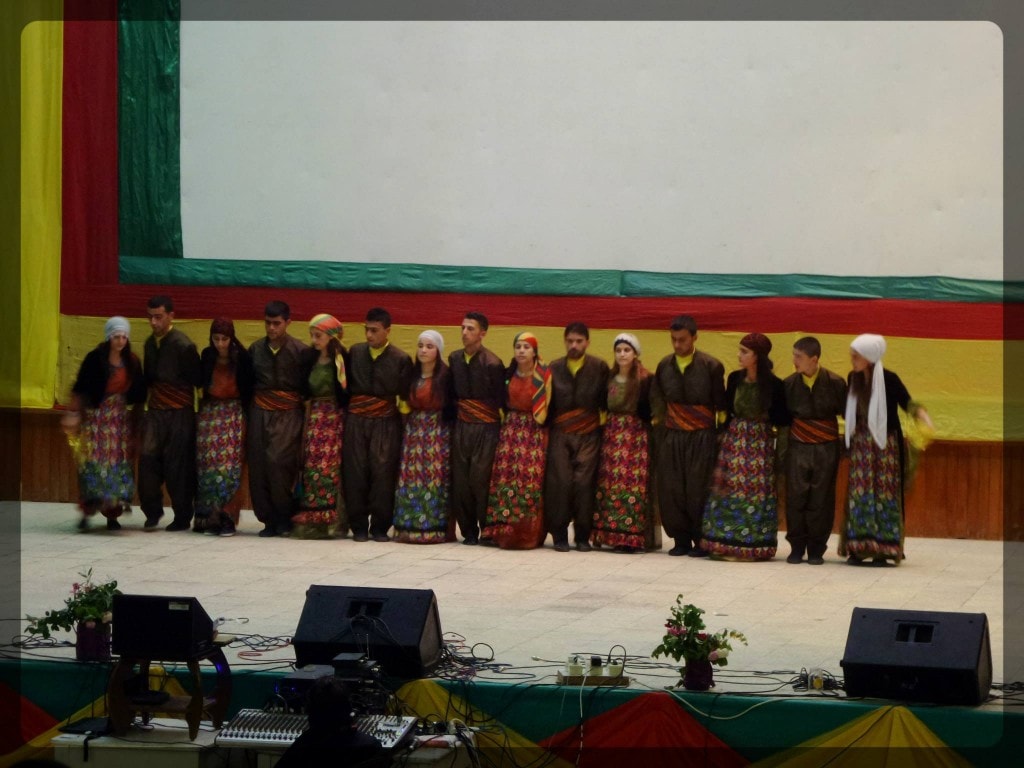 Dance students perform newly-learned traditional Kurdish dance styles in Rojava.